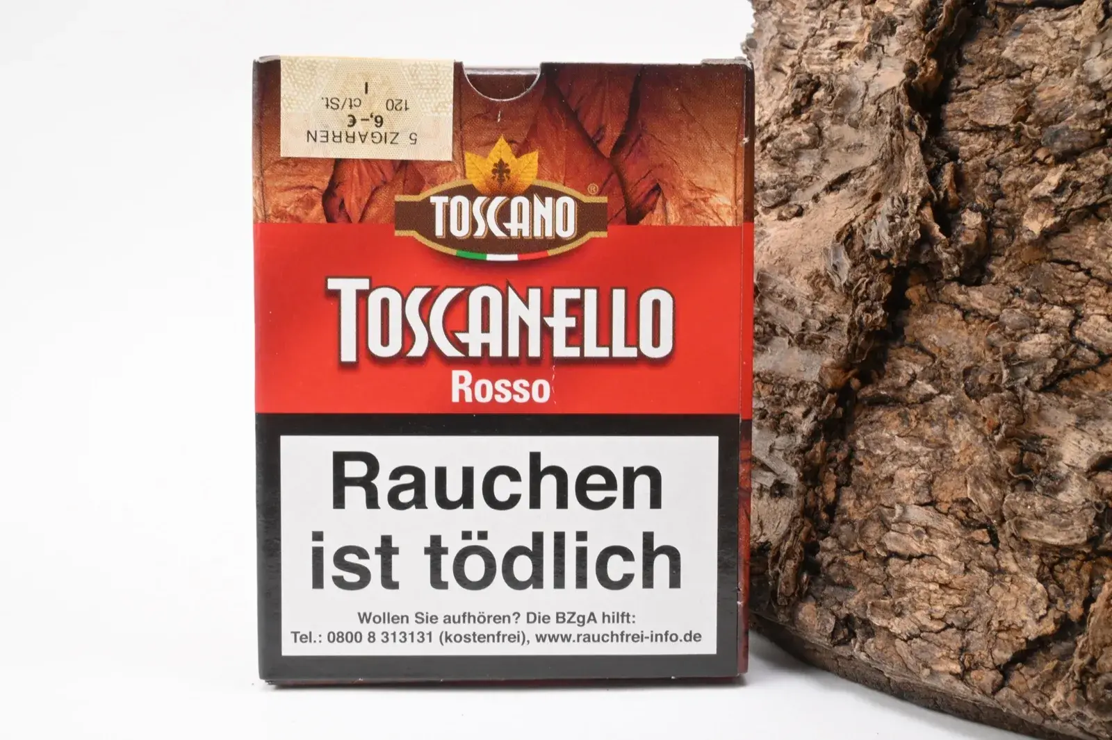 Ảnh chụp hộp Toscanello Rosso dành cho thị trường Đức, có tem thuế và cảnh báo sức khỏe bằng tiếng Đức.